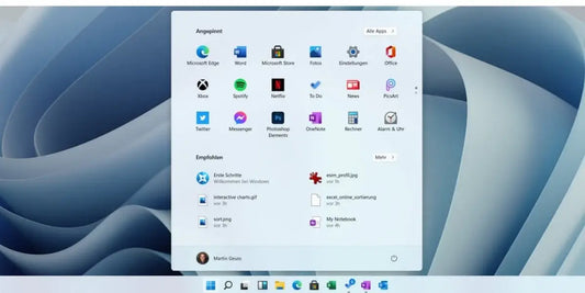 Microsoft Windows 11 Pro Benutzeroberfläche mit Startmenü, Apps und modernem Desktop